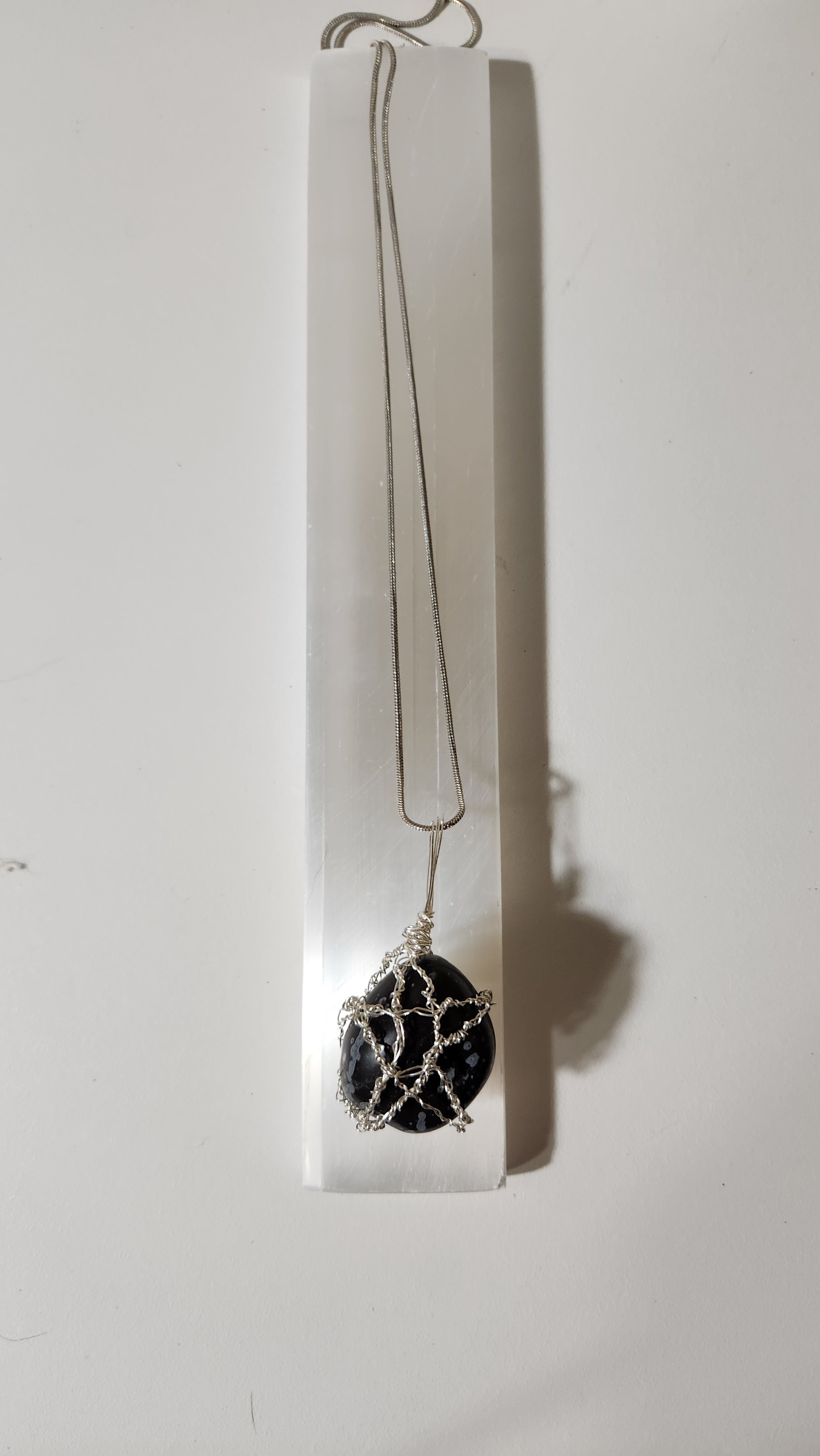 Snowflake Obsidian Star necklace.