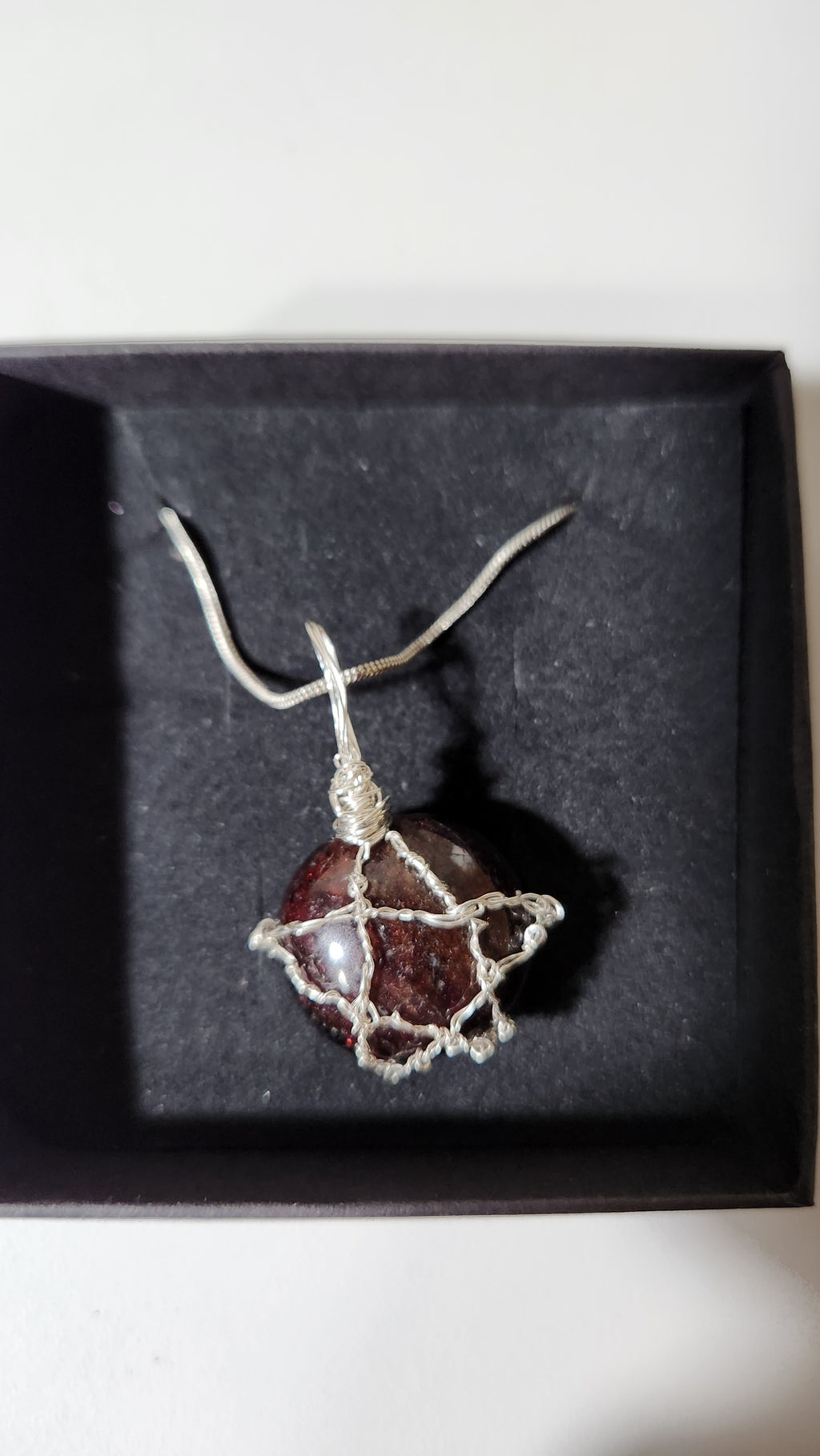 Garnet wire wrap star design necklace