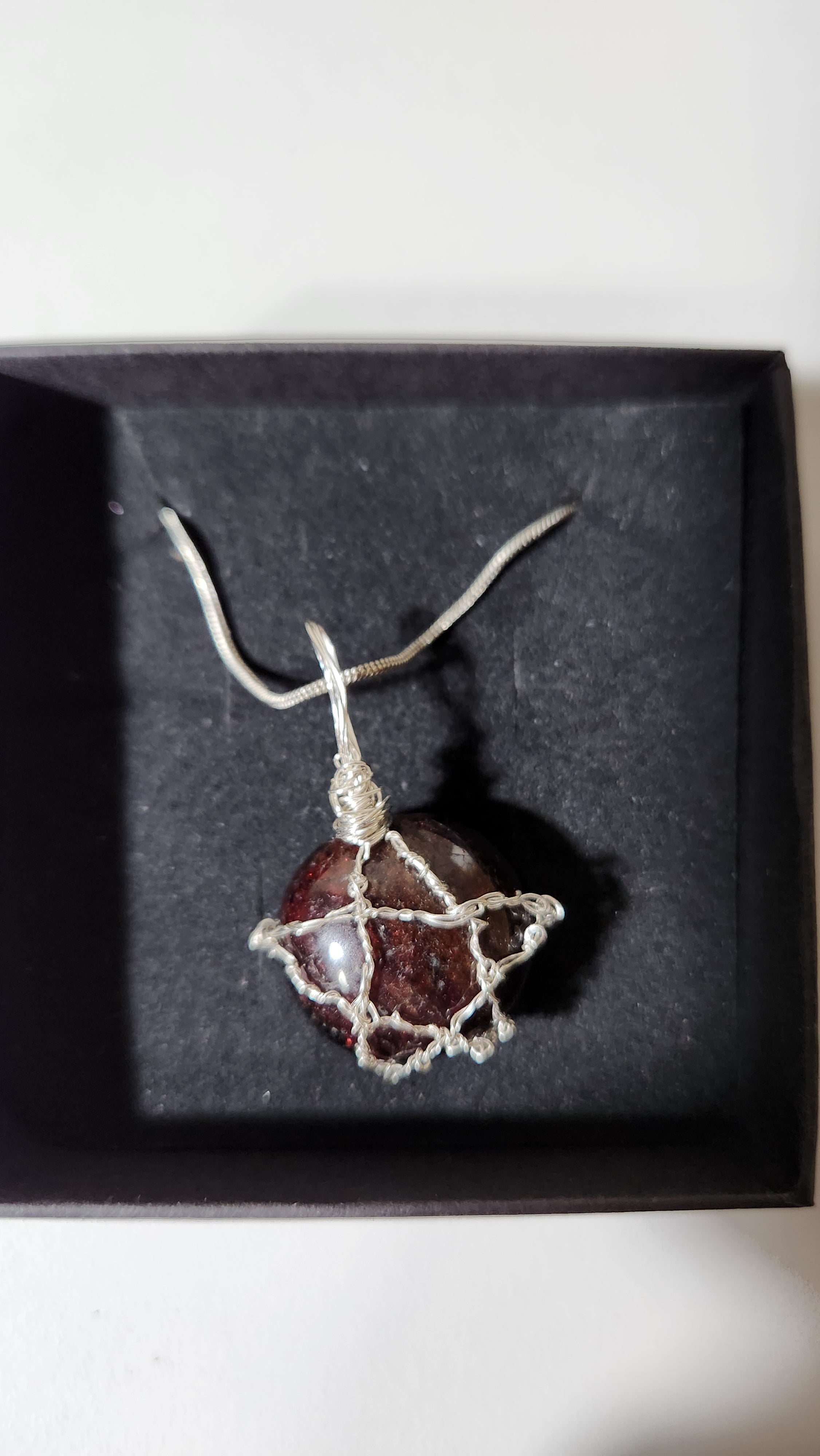 Garnet wire wrap star design necklace