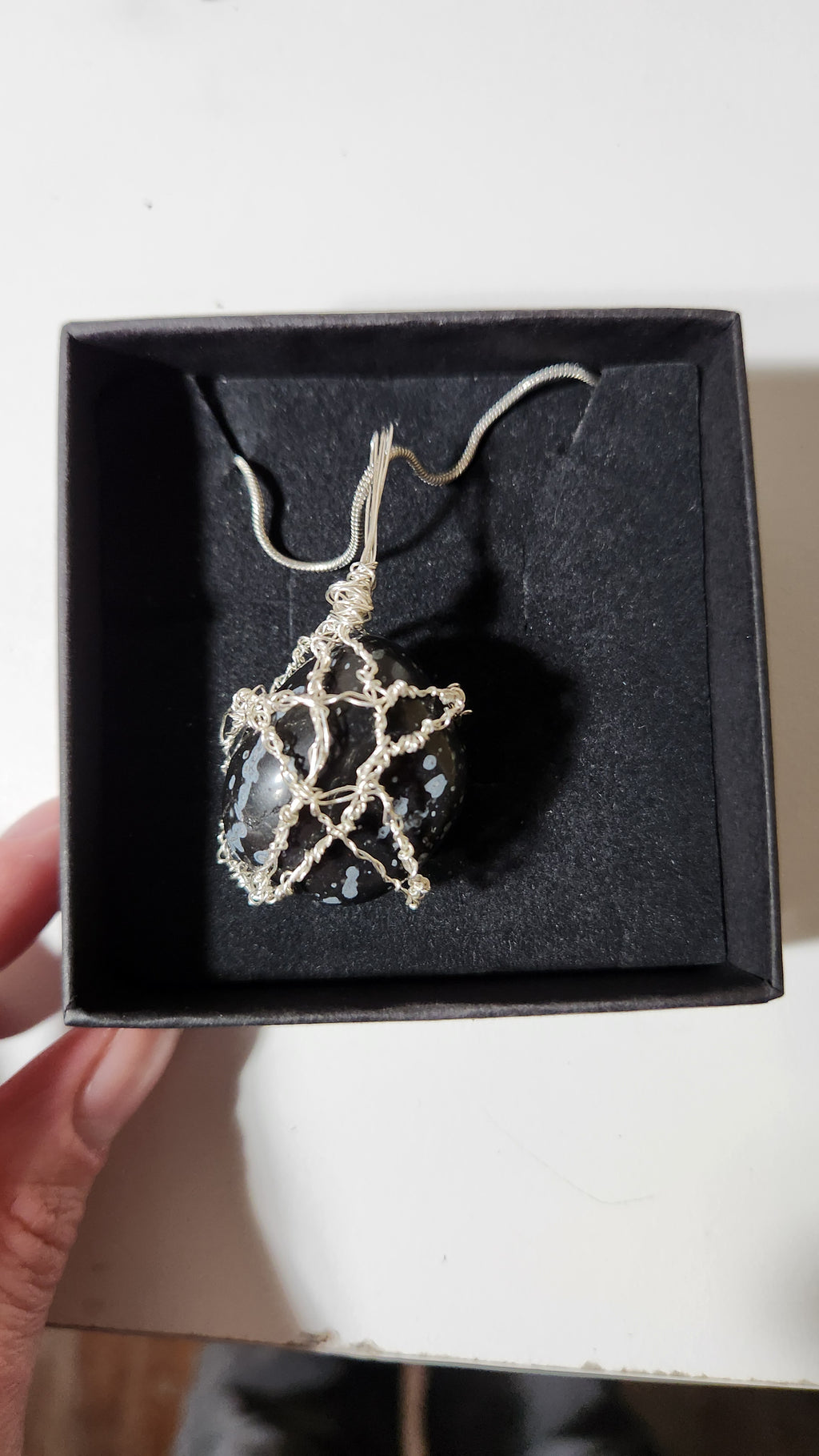 Snowflake Obsidian Star necklace.