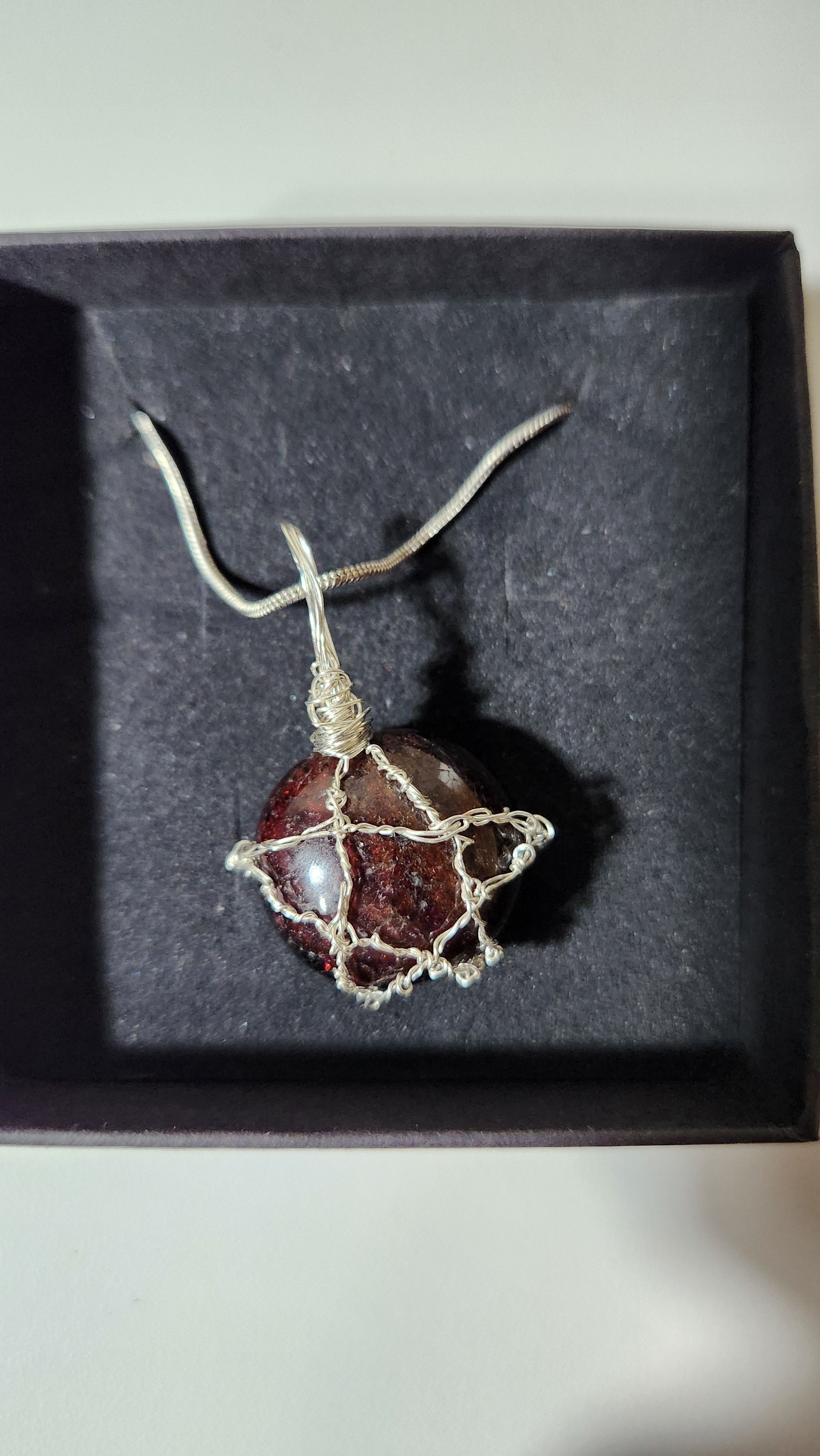 Garnet wire wrap star design necklace